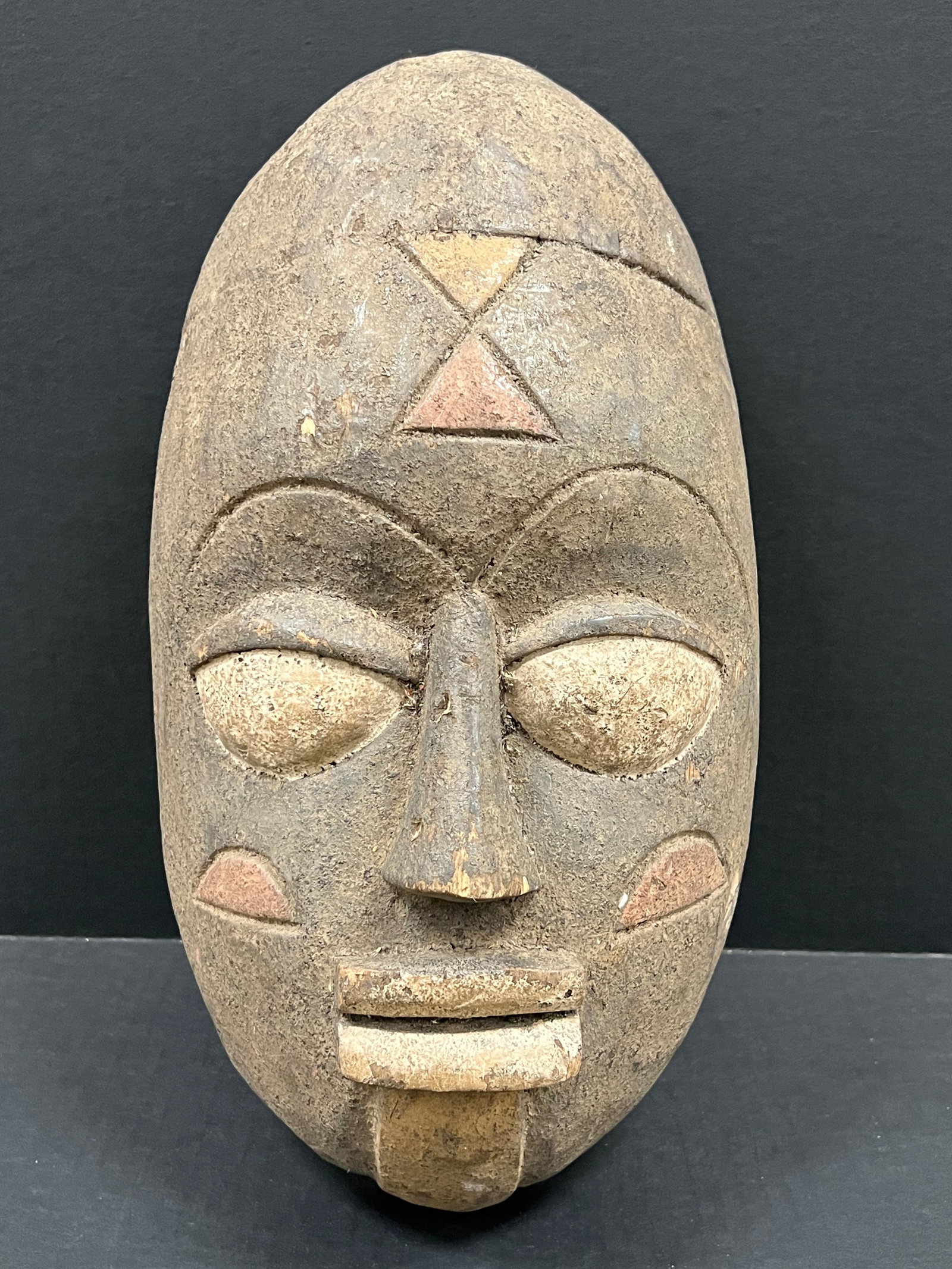 African Tribal Art Carved Wood Yuroba Mask: Title: Yuroba Mask Date/Period: Late 20th Century Materials: Wood Size: 15.5" h x 8" w Reserve: $80.00 Shipping: Domestic: Flat-rate of $40.00 to anywhere within the contiguous U.S. International: