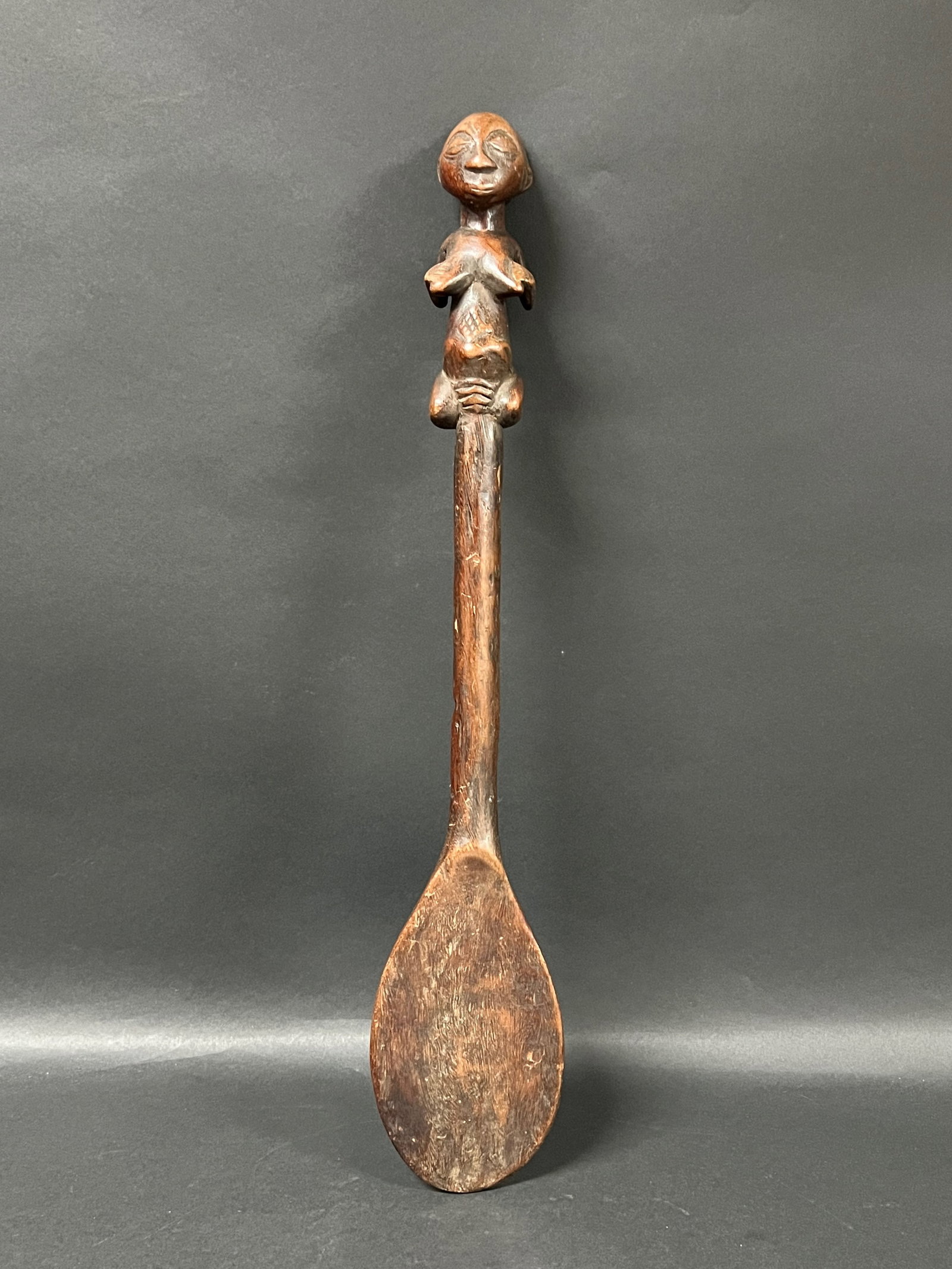 African Tribal Art Carved Wood Kuba Spoon: Title: Kuba Spoon Date/Period: Late 20th Century Materials: Wood Size: 21.5" h x 4" w Reserve: $100.00 Shipping: Domestic: Flat-rate of $30.00 to anywhere within the contiguous U.S. International: For