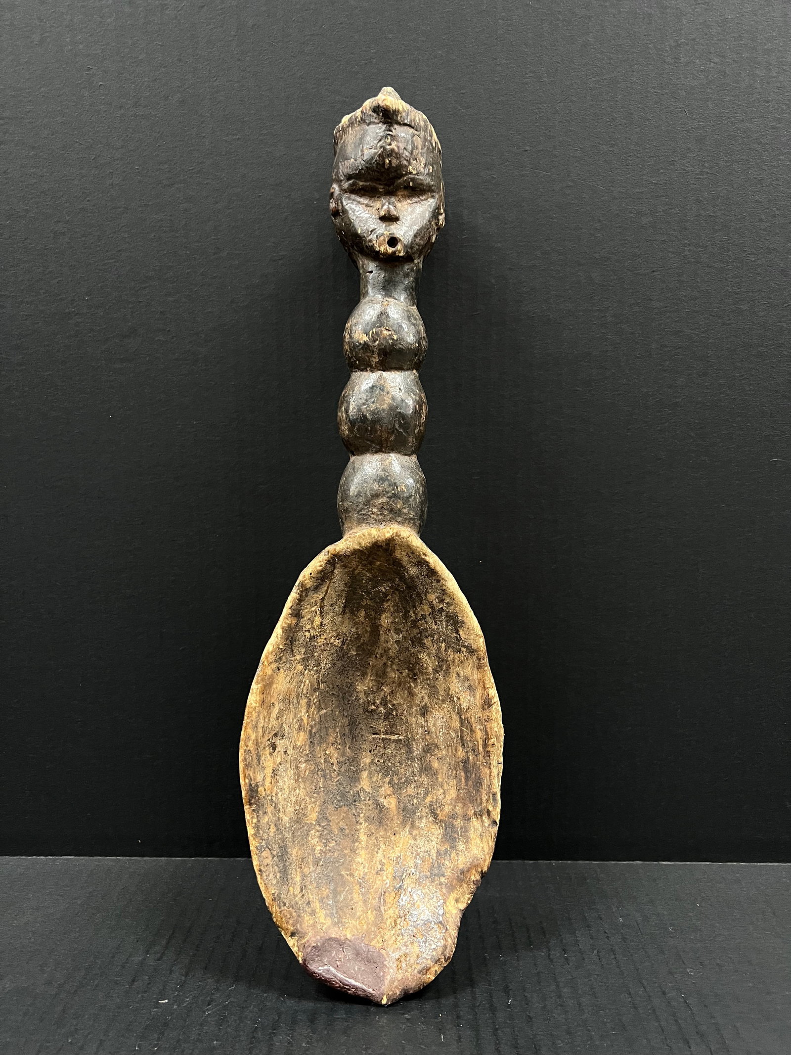 African Tribal Art Carved Wood Dan Spoon: Title: Dan Wooden Spoon Date/Period: Late 20th Century Materials: Wood Size: 17" h x 5" w Reserve: $100.00 Shipping: Domestic: Flat-rate of $30.00 to anywhere within the contiguous U.S. International: