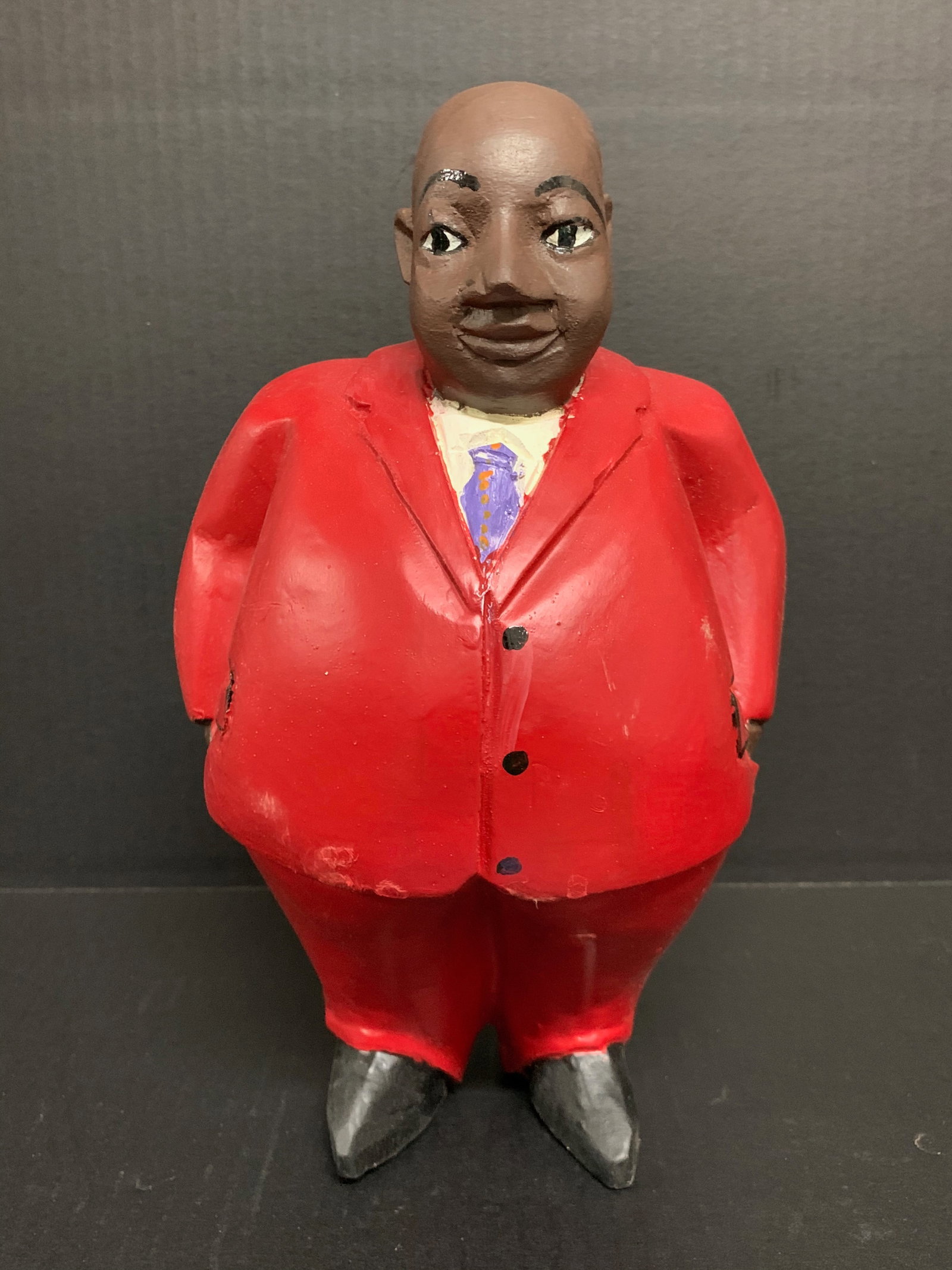 African Tribal Art Carved Wood Colonial Male Statue: Title: Colonial Male Statue Date/Period: Late 20th Century Materials: Wood Size: 13" h x 7.5" w Reserve: $80.00 Shipping: Domestic: Flat-rate of $30.00 to anywhere within the contiguous U.S. Internati