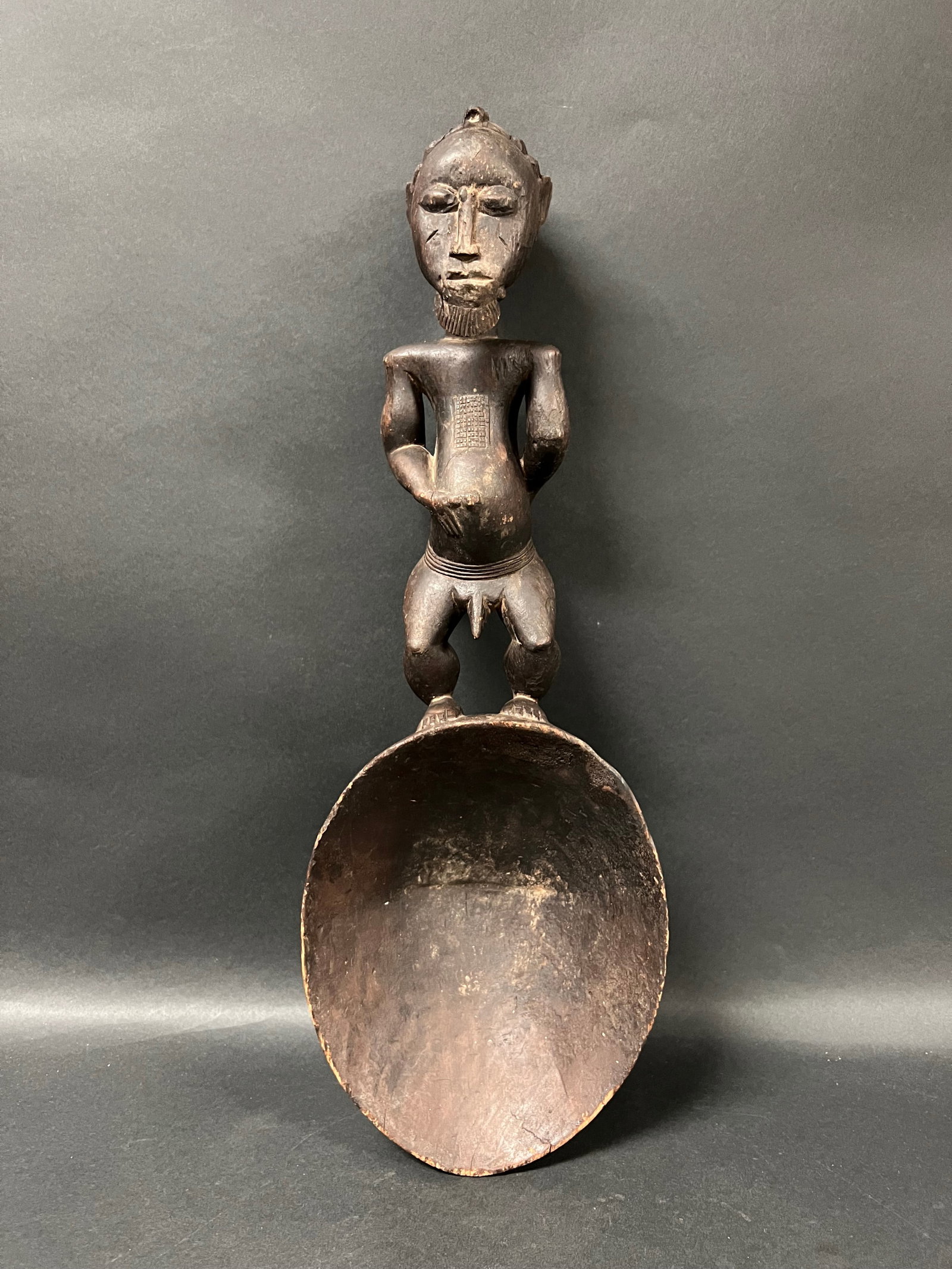 African Tribal Art Carved Wood Baule Spoon: Title: Baule Spoon Date/Period: Late 20th Century Materials: Wood Size: 20" h x 7" w Reserve: $200.00 Shipping: Domestic: Flat-rate of $40.00 to anywhere within the contiguous U.S. International: Fore