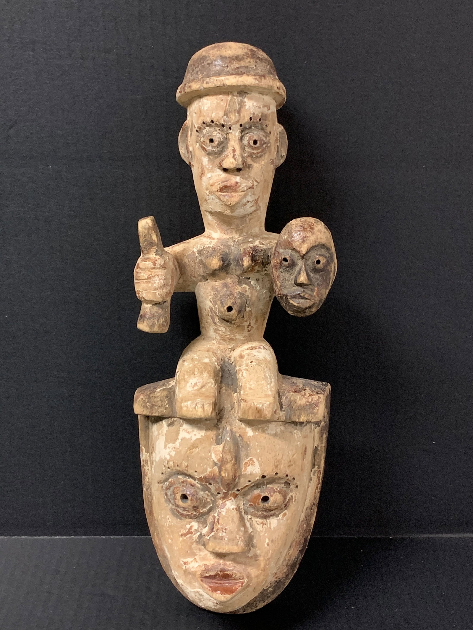 African Tribal Art Carved Wood Ibo Mask: Title: Ibo Mask Date/Period: Late 20th Century Materials: Wood Size: 15' h x 6" w Reserve: $100.00 Shipping: Domestic: Flat-rate of $30.00 to anywhere within the contiguous U.S. International: Foreign