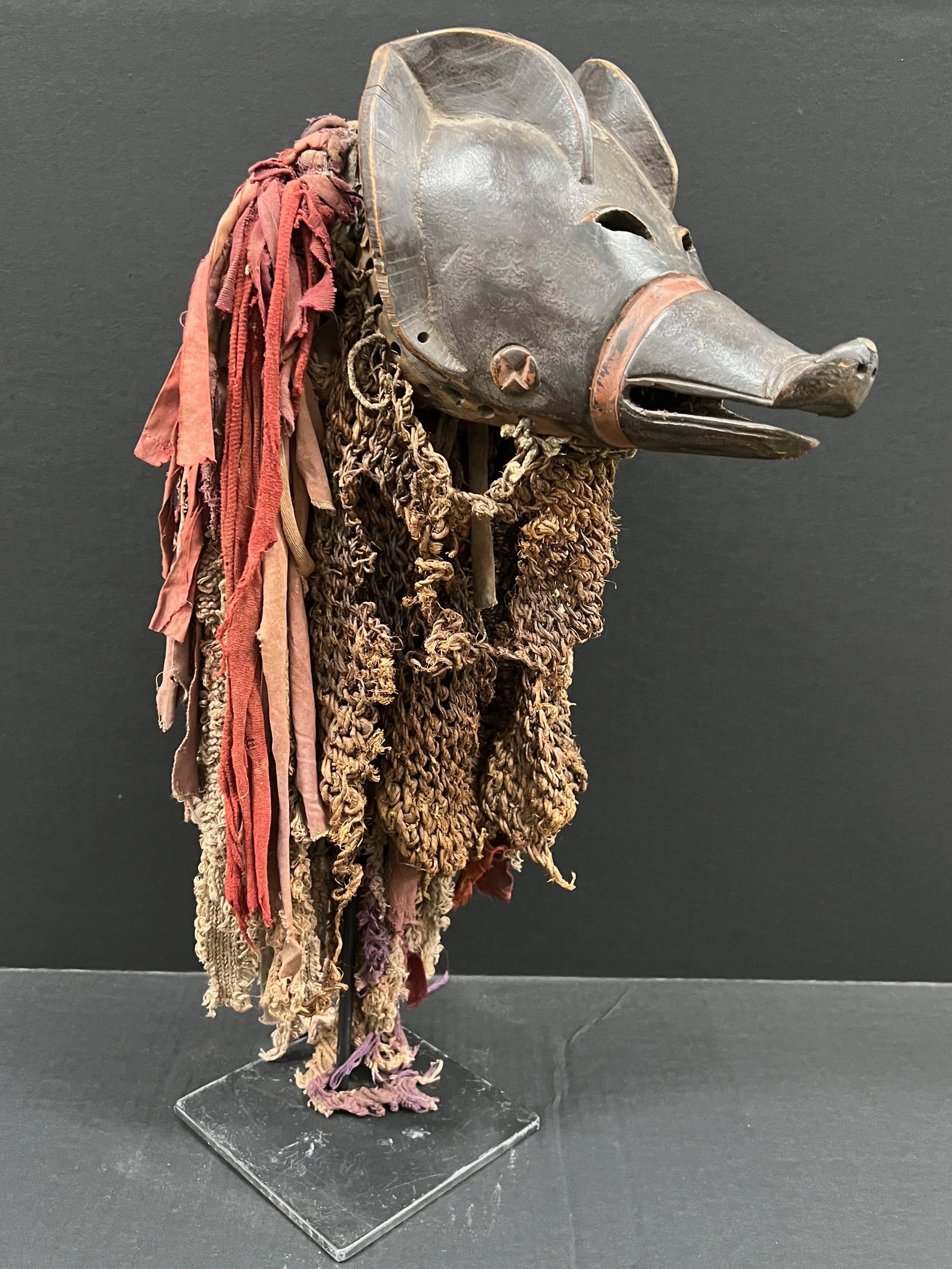 African Tribal Art Carved Wood Ngulu Pig Mask with Display Stand: Title: Ngulu Pig Mask with Display Stand Date/Period: Late 20th Century Materials: Wood Size: 22" h x 12.5" w Reserve: $1,800.00 Shipping: Domestic: Flat-rate of $60.00 to anywhere within the contiguo