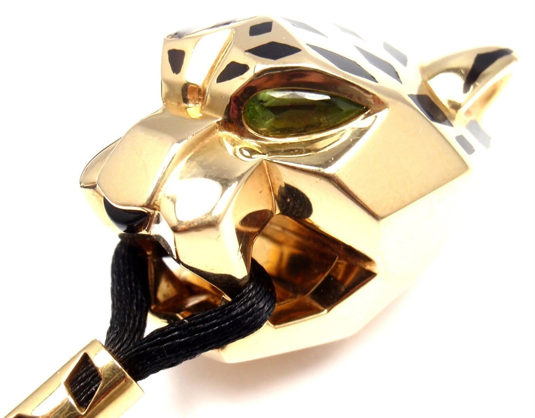 Authentic Cartier Panther Panthere 18k Yellow Gold Emerald Lacquer Cord Necklace: Authentic Cartier Panther Panthere 18k Yellow Gold Emerald Lacquer Cord Necklace About This Piece: Retail Price: $27,000 plus tax. Metal: 18k Yellow Gold Measurements: Length: 21" Pendant: approx.