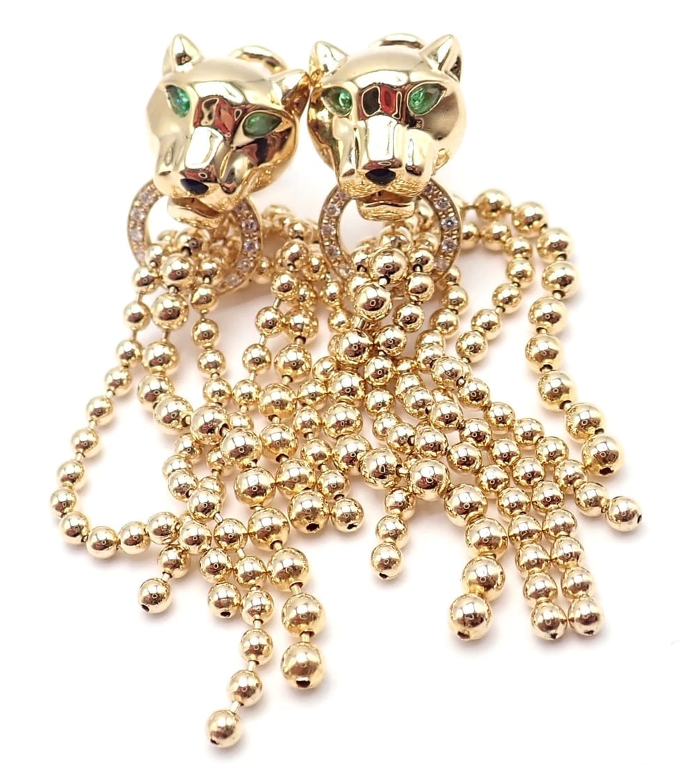 Authentic! Cartier Panther Panthere 18k Gold Diamond Tsavorite Onyx Earrings: Authentic! Cartier Panther Panthere 18k Gold Diamond Tsavorite Onyx Earrings About This Piece: The Retail Price: $24,800 Metal: 18k Yellow Gold Size: 47.43mm x 10.37mm Weight: 17.8 grams Stones: 34