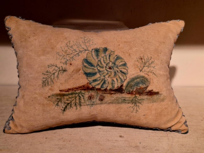 Gift for celebrating a birth: Pennsylvania c. 1930-40s. Great theorem painted velvet top with shells and coral. Blue satin backing which has wear. Probably stuffed with clothes, it is heavy. 6 1-2" long. A rare piece, unique. Ship