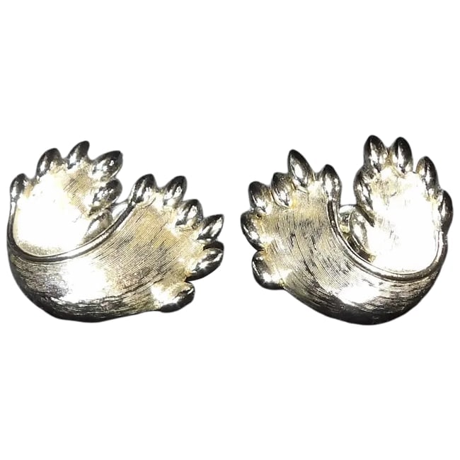 Vintage 1960's Crown Trifari Clip on Earrings- Silver Tone: This pair of 1960's Crown Trifari Clip on Earrings- Silver Tone are in excellent condition. Trifari is one of the highest quality producers of costume jewelry of the Mid-Century period. They measure