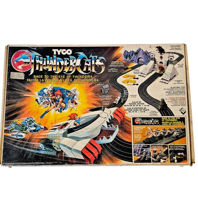 1986 Tyco "Race to the Eye of Thundera" Thundercat Slot Car Set.: Title: 1986 Tyco "Race to the Eye of Thundera" Thundercat Slot Car Set. Description: 1986 Tyco "Race to the Eye of Thundera" Thundercat Slot Car Set. Untested. Appears complete. Easy "Clik" track asse