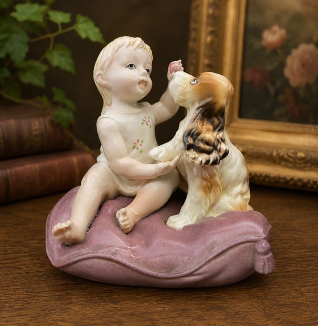 Andrea by Sadek Child With Spaniel Dog Porcelain Figurine No. 3407 Japan: Date/Period: unknown Dimension: Approx. 4" tall x 4" x 3.25" Material: porcelain ceramic Additional Information: Charming vintage porcelain figurine by Andrea by Sadek, featuring a young child seated