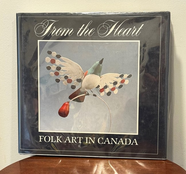 From the Heart Folk Art in Canada: Wonderfully illustrated book detailing the fine folk art objects in our northern neighbor. Published in 1983. With protective cover. Shipping: Domestic: Flat-rate of TBD to anywhere within the