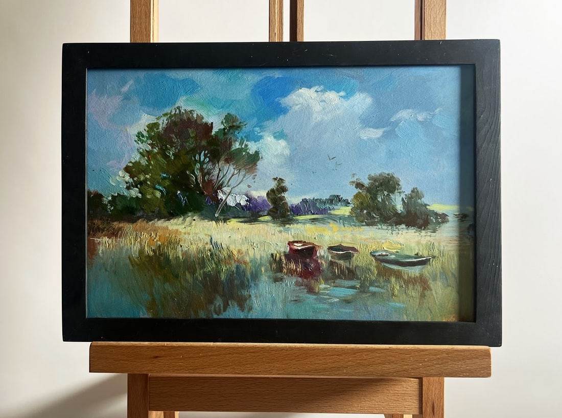 Oil painting Three boats on the river Yuriy Suprunchuk: Title: Oil painting Three boats on the river Yuriy Suprunchuk Description: NoAAA4185 The painting titled "Three boats on the river" captures a peaceful and idyllic riverside scene bathed in warm