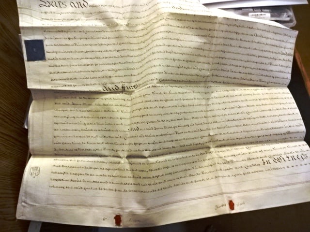 1788 Large Vellum Indenture Red Wax Seals: Large handwritten English vellum indenture dated 1788 during the reign of George III being the conveyance of property in the county of Somerset. An indenture of three parts on two sheets of vellum,