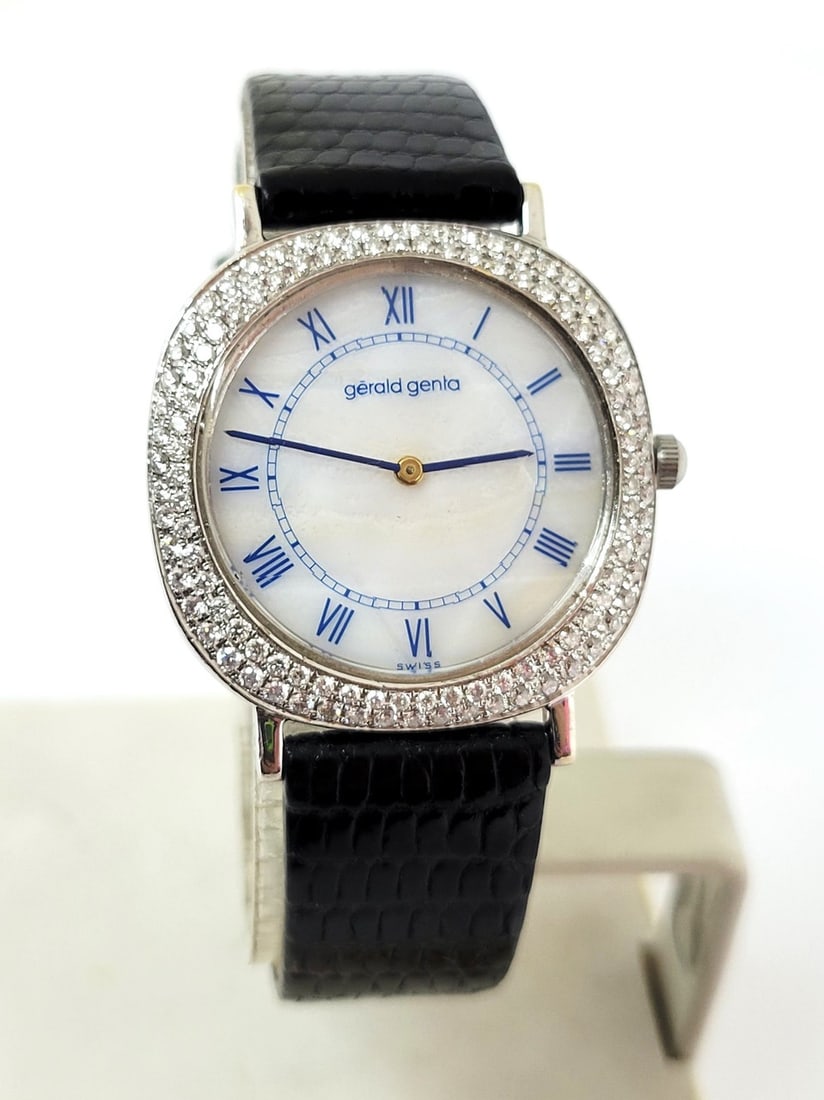 Solid 18k White Gold GERALD GENTA Unisex Watch G1153.7 with 2.4 ct Diamonds RARE: Solid 18k White Gold GERALD GENTA Unisex Watch G1153.7 with 2.4 ct Diamonds* EXLNT* VERY RARE This Men's Gerald Genta watch is Swiss-made * Solid 18k white gold case in shiny finish enhanced with natu