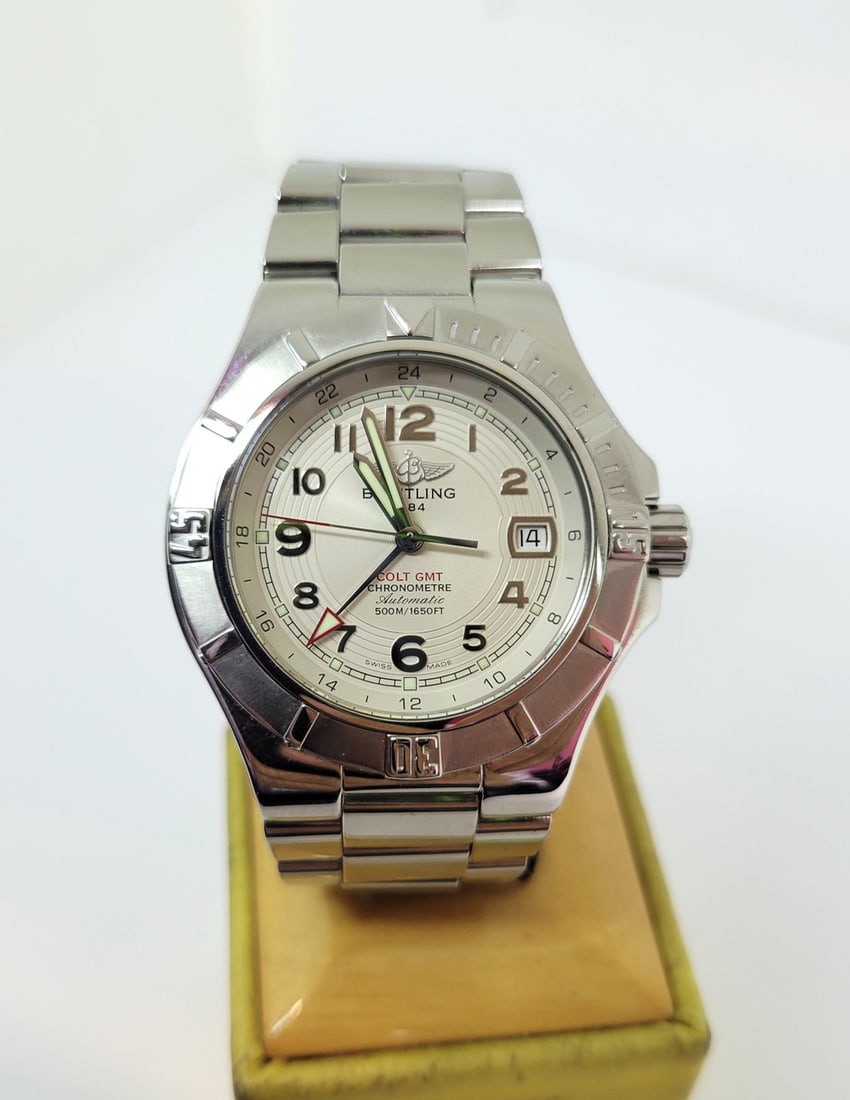 Men's BREITLING COLT GMT Automatic CHRONOMETRE 500m/1650ft Watch A32370* EXLNT: Mens BREITLING COLT GMT Automatic CHRONOMETRE 500m/1650ft Watch A32370* EXLNT* EXLNT This Men's BREITLING watch is Swiss-made. Great present for yourself or someone you love! * Stainless steel case, b
