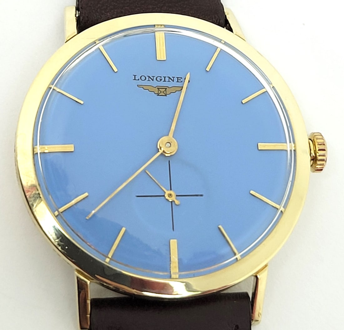Vintage 14k Yellow LONGINES Winding Watch Ref 1017 1960s Cal 19.4 EXLNT SERVICED: Vintage Solid 14k Yellow Gold LONGINES Winding Watch Ref 1017 c.1960s* Excellent Condition* SERVICED This Men's Longines watch is Swiss made. Great present for yourself or someone you love as well as