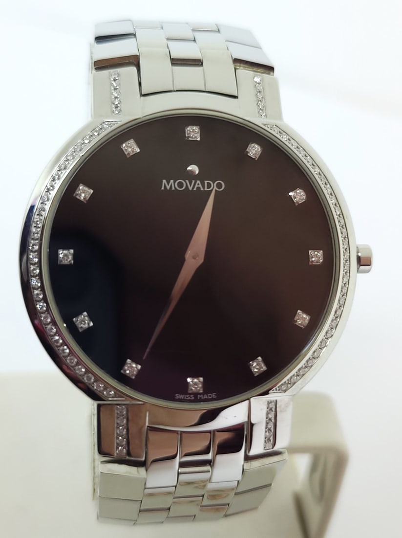 Steel MOVADO Faceto 84.45.1892 Diamond Wrist Watch 38 mm Black Dial Quartz EXLNT: Steel MOVADO Faceto 84.45.1892 Diamond Wrist Watch 38 mm Black Dial Quartz EXLNT?? This Men's Movado watch is Swiss made. Great present for yourself or someone you love! * Stainless steel case & back 