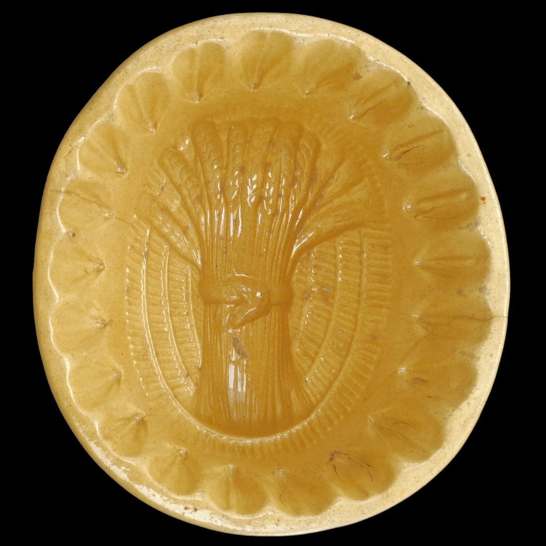 Victorian Yellow Ceramic Mold Wheat Sheaf: Title:Victorian Yellow Ceramic Mold Wheat Sheaf Size:7 1/8 in (18.1 cm) long x 6 5/8 in (16.8 cm) wide x 4 1/8 in (10.5 cm) tall. Description: Reserve: $50.00 Shipping: Domestic: Flat-rate of $19.77