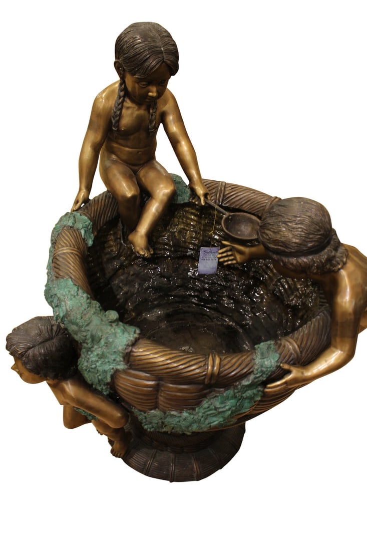 Kids Playing in Fountain Bronze Statue - Size: 38"L x 32"W x 45"H.: Title:Kids Playing in Fountain Bronze Statue - Size: 38"L x 32"W x 45"H. Description:Three playful kids are the center of this delightful indoor/outdoor fountain. The detailed resin casting used to