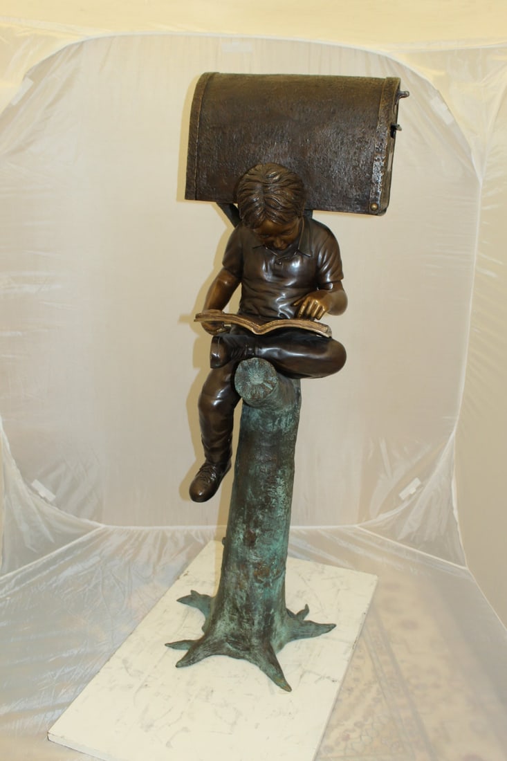Boy Sitting by a Mailbox reading a book Bronze Statue - 16"L x 20"W x 50"H. - 11