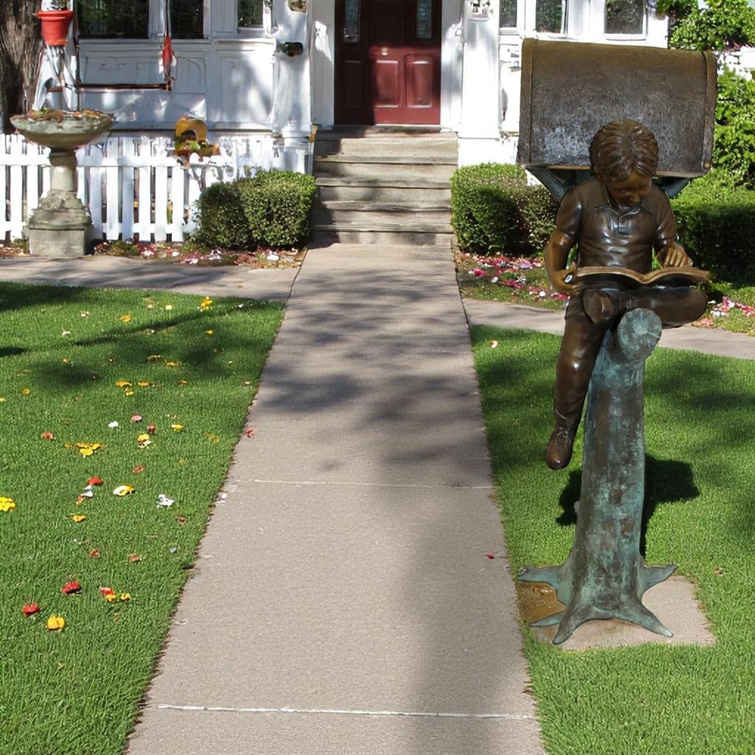 Boy Sitting by a Mailbox reading a book Bronze Statue - 16"L x 20"W x 50"H. - 3
