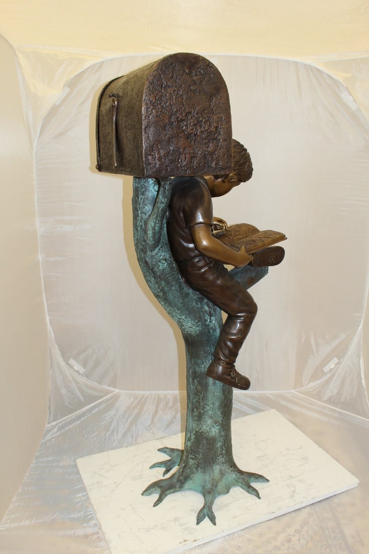 Boy Sitting by a Mailbox reading a book Bronze Statue - 16"L x 20"W x 50"H. - 8