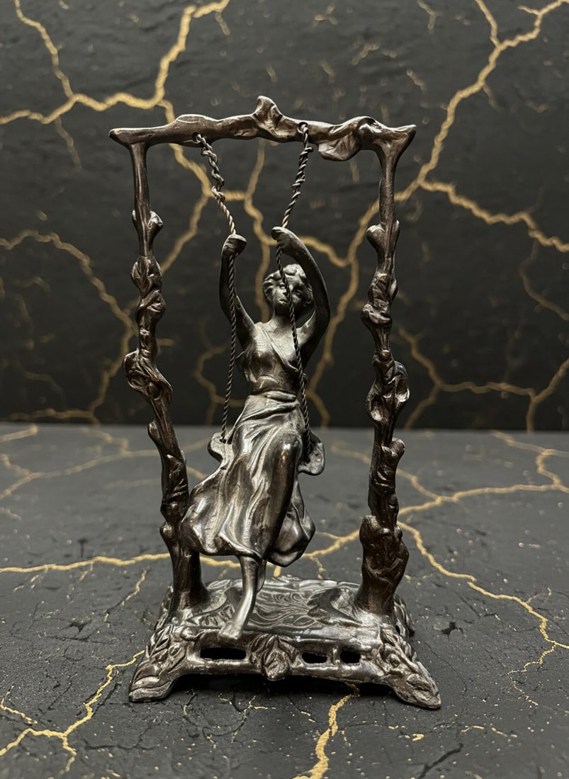 Art Nouveau Bronze Girl On Swing Statue Figurine Vintage Style Sculpture: Title:Art Nouveau Bronze Girl On Swing Statue Figurine Vintage Style Sculpture Description:This medium-sized sculpture depicts a girl on a swing, capturing the elegant aesthetic of the early 20th-cent