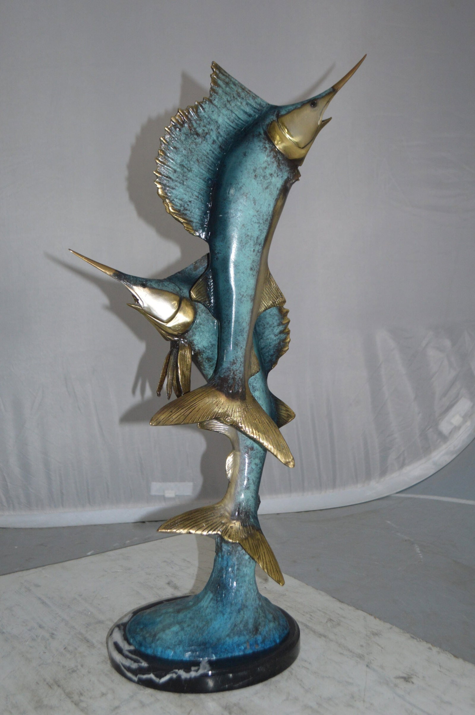 Two Sailfish jumping of water bronze statue - Size: 13"L x 6"W x 28"H. - 4