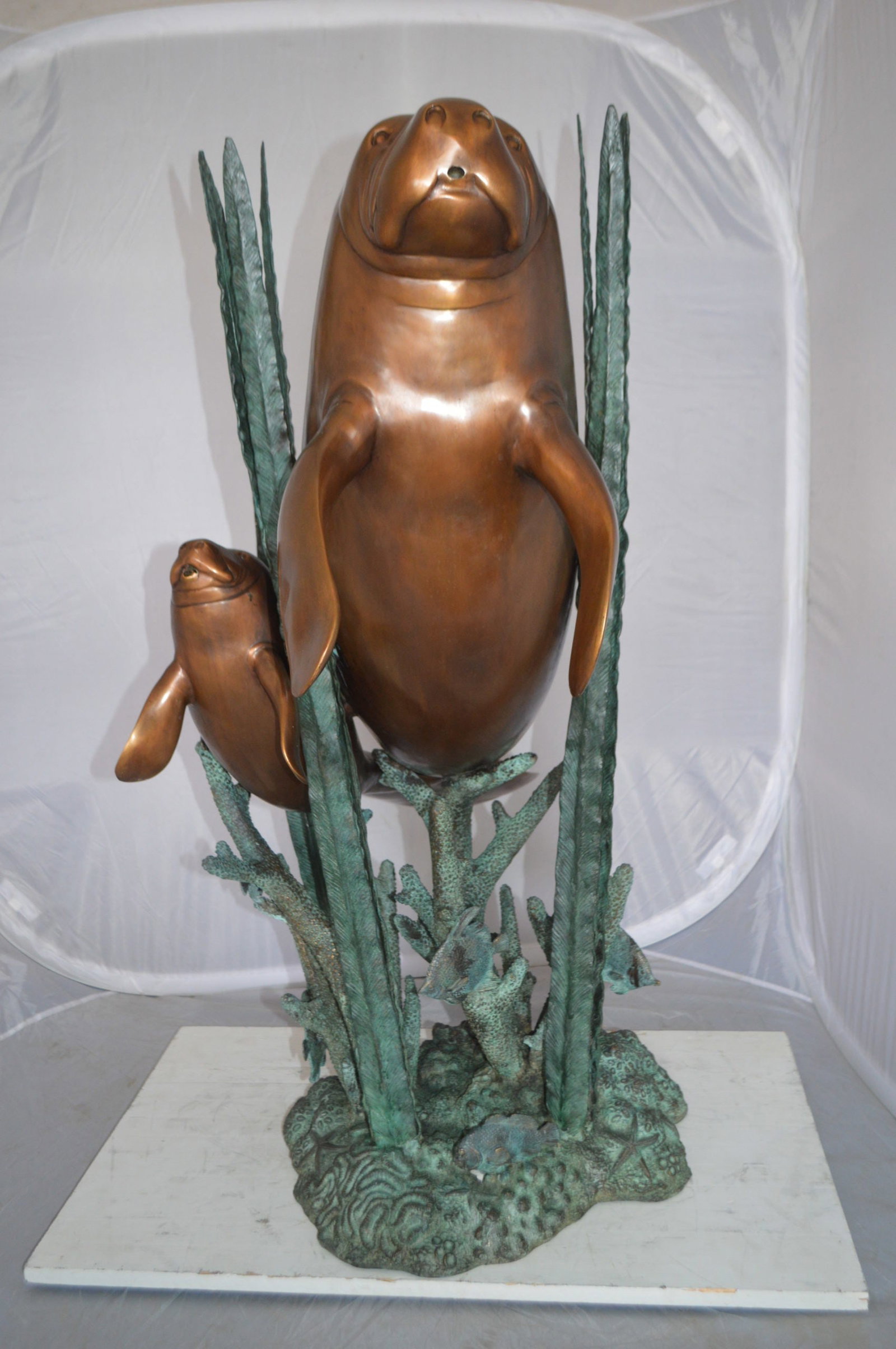 Two Large Manatees swimming Bronze Fountain Statue - Size: 23"L x 42"W x 42"H. - 3