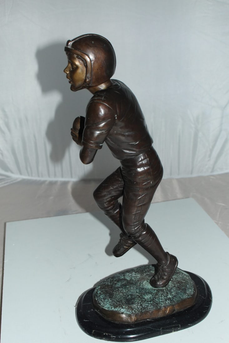 Boy playing football Bronze Statue - Size: 10"L x 8"W x 20"H. - 9