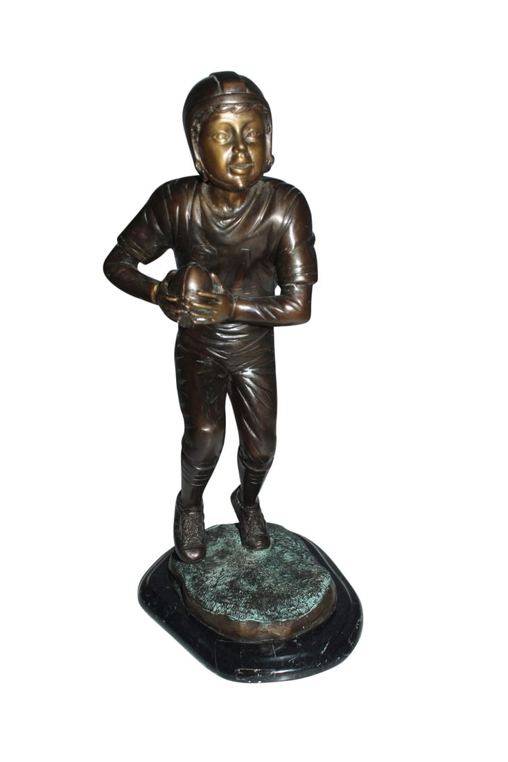 Boy playing football Bronze Statue - Size: 10"L x 8"W x 20"H.: Title:Boy playing football Bronze Statue - Size: 10"L x 8"W x 20"H. Description:This Bronze Sculpture of a boy playing football, was cast by the traditional, Lost Wax Bronze Casting method. She has pe