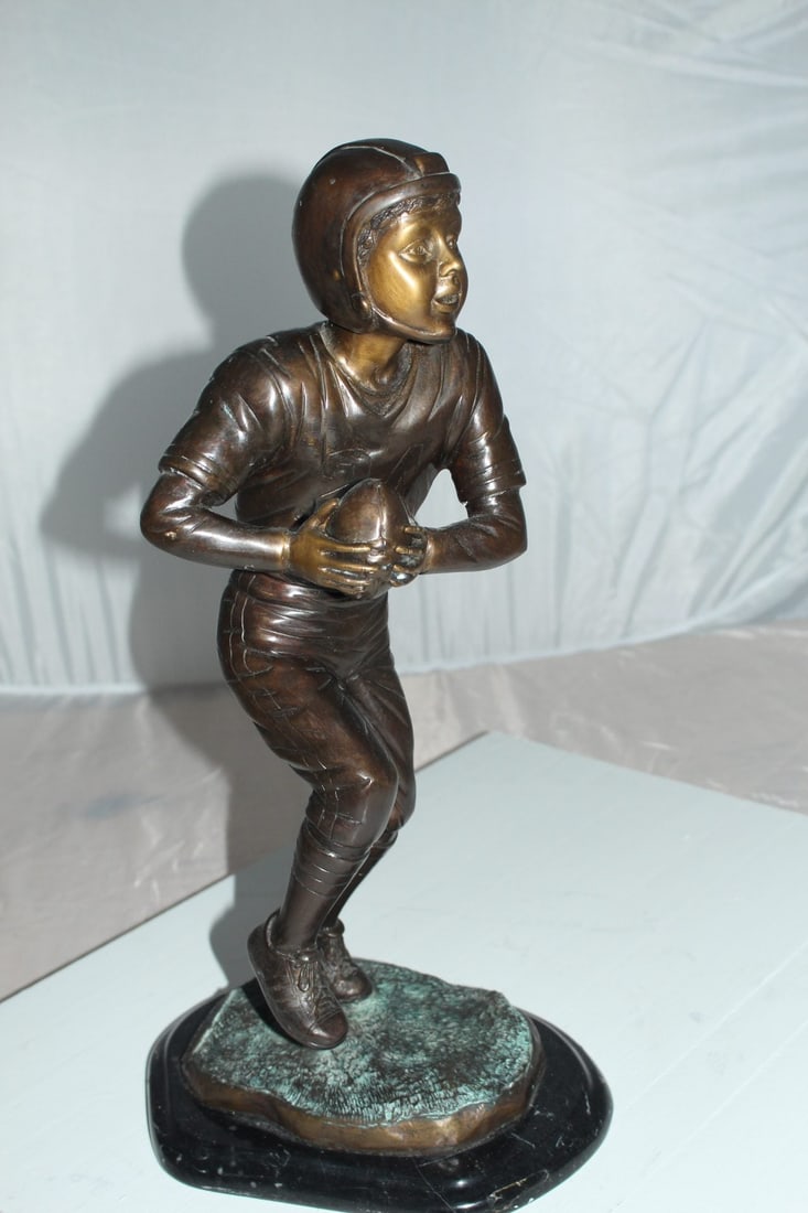 Boy playing football Bronze Statue - Size: 10"L x 8"W x 20"H. - 4