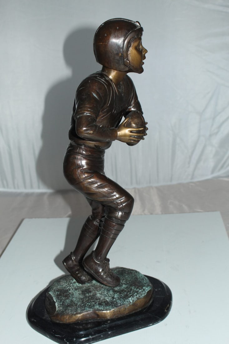 Boy playing football Bronze Statue - Size: 10"L x 8"W x 20"H. - 6