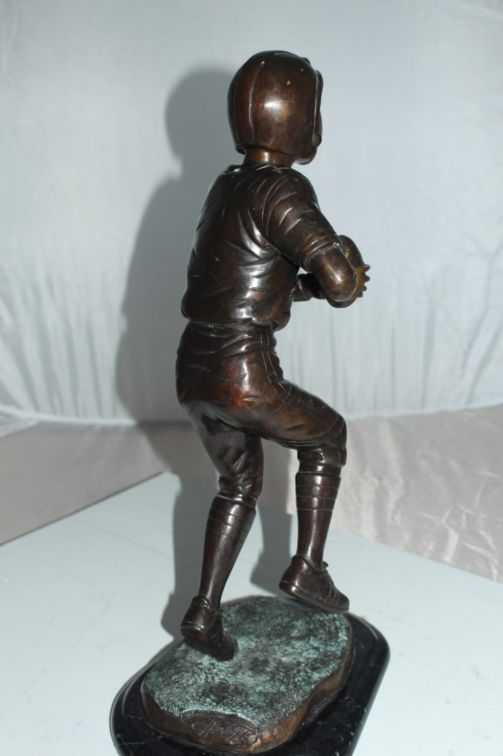 Boy playing football Bronze Statue - Size: 10"L x 8"W x 20"H. - 7