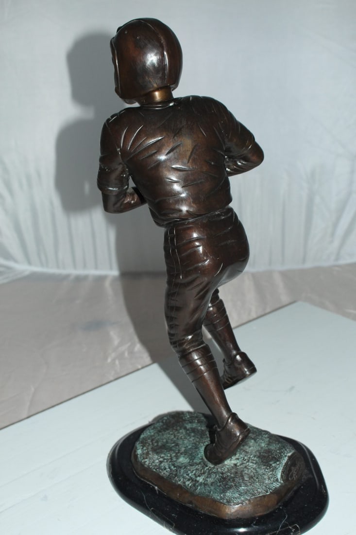 Boy playing football Bronze Statue - Size: 10"L x 8"W x 20"H. - 8