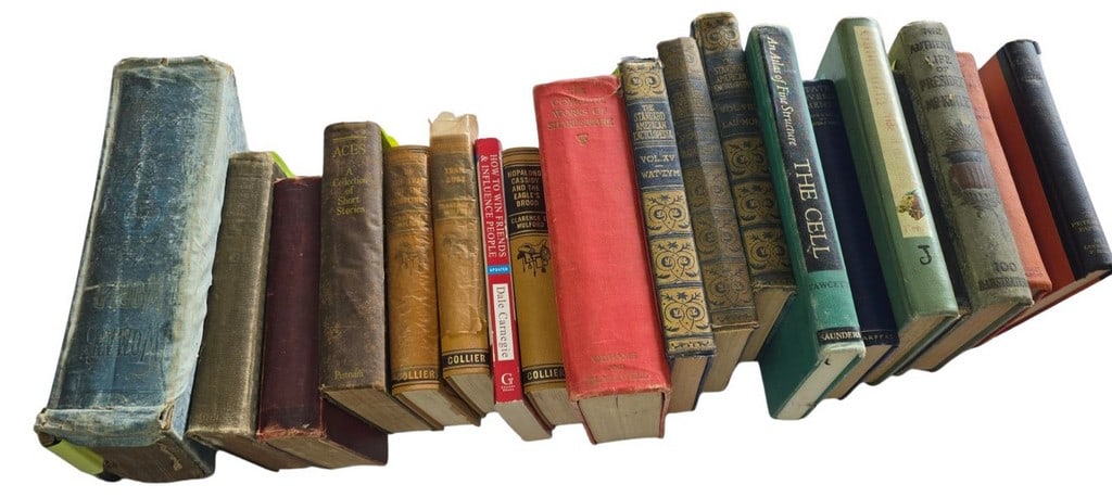 Collection of Antique and Vintage Books, Mixed Subjects: An eclectic collection of approximately 25-30 antique and vintage books spanning various subjects and publishers. The collection includes titles such as "How to Win Friends & Influence People" by