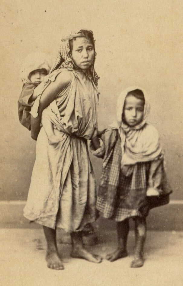 Tunisian Children Portrait – Alary & Geiser CDV Photo c 1870: Title: Tunisian Children Portrait – Alary & Geiser CDV Photo c 1870 Description: Individual CDV portrait of a child in ornate clothing, likely part of a studio series by Alary & Geiser in Tunis.
