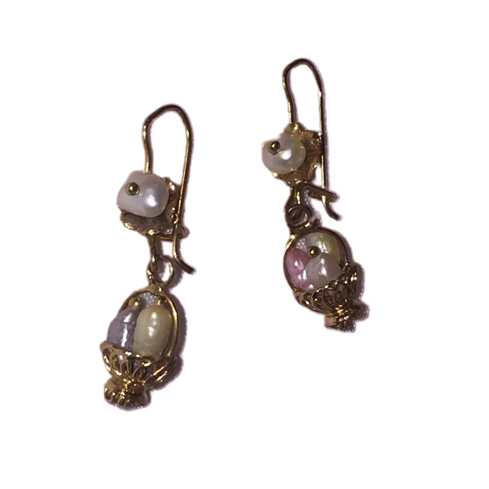 Mexican Mestizo Filigree 8 Kt Gold Freshwater Pearl Basket Earrings: Title:Mexican Mestizo Filigree 8 Kt Gold Freshwater Pearl Basket Earrings Description:Mexican Mestizo hand made filigree 8 Kt yellow gold freshwater pearl basket earrings. Circa 1960's. Earrings are
