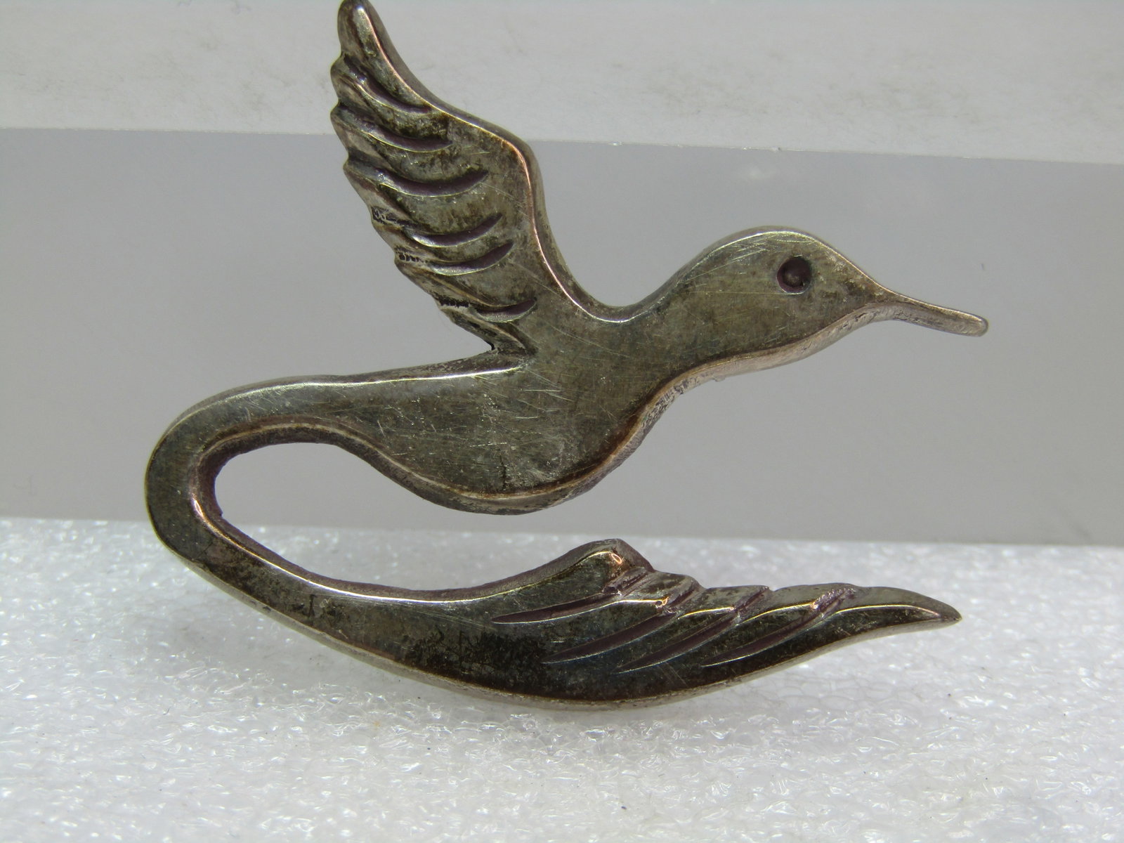 Vintage Sterling Hummingbird Brooch, Signed A.M., Possibly Navajo, 1960's: Title:Vintage Sterling Hummingbird Brooch, Signed A.M., Possibly Navajo, 1960's Description:Vintage Sterling Hummingbird Brooch, Signed A.M., Possibly Navajo, 1960's. This is a thick modernist depicti