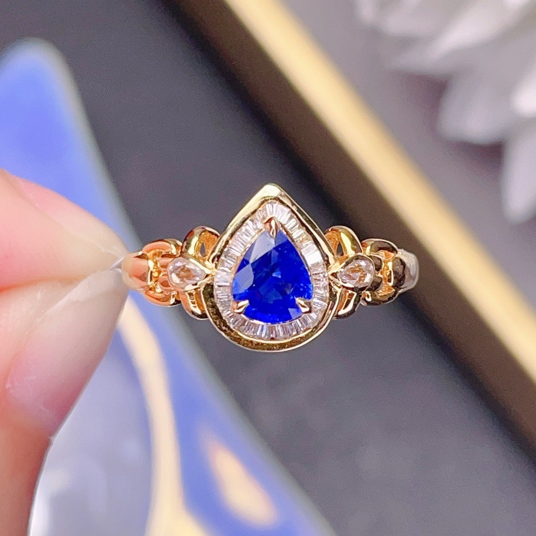 14K GOLD 0.85 CT NATURAL SAPPHIRE and DIAMOND RING: Title:14K GOLD 0.85 CT NATURAL SAPPHIRE and DIAMOND RING Description:Ref:230678488Gold Content:14K GoldRing Size:7.25USMain Gemstone:SapphireNumber of stones:1Shape:PearCarat Weight:0.85ct Color:Royal