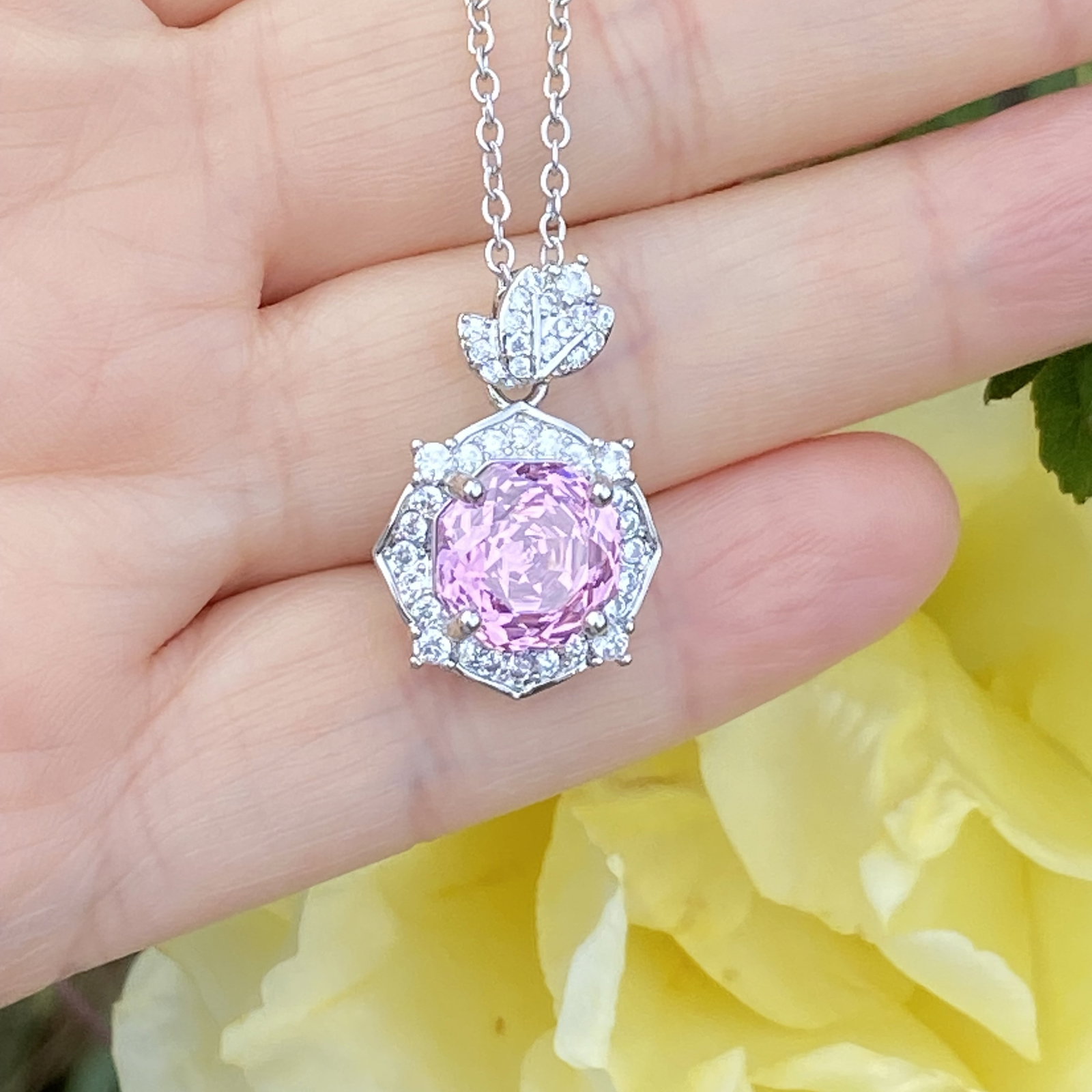 18K White Gold Plated Radiant-Cut Pink Sapphire and Moissanite Halo Pendant Necklace: Title: 18K White Gold Plated Radiant-Cut Pink Sapphire and Moissanite Halo Pendant Necklace Description:An elegant radiant-cut Pink sapphire pendant necklace, beautifully surrounded by a halo of