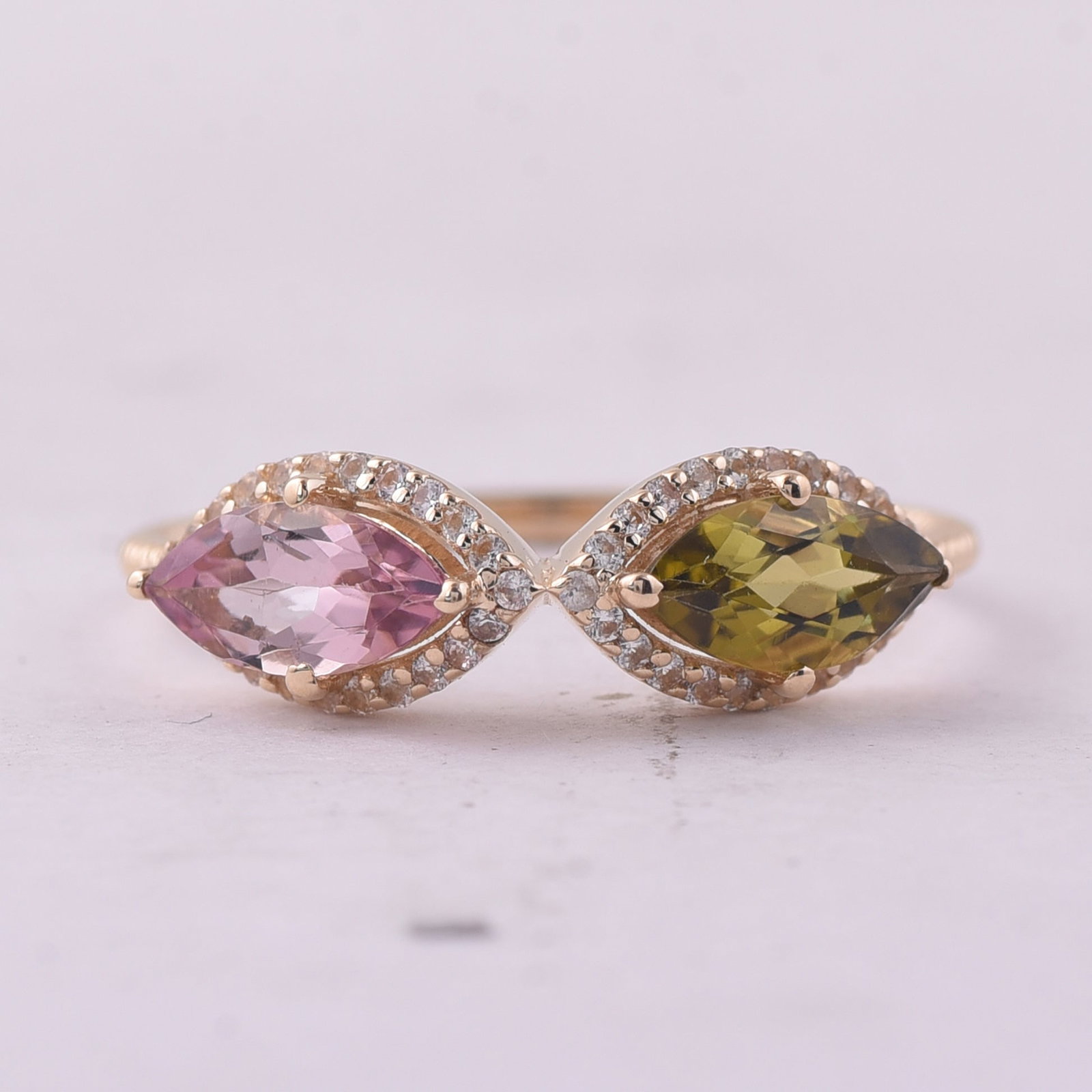 1.16 Ct Marquise Tourmaline 9K Gold Ring: 1.16 Total Carat Tourmaline 9K Gold Ring Specifications: Total Weight 1.58 g Center Gemstone Tourmaline Gemstone Carat Weight 0.96 Carats Gemstone Measurements 8X4 mm Additional Gemstones White