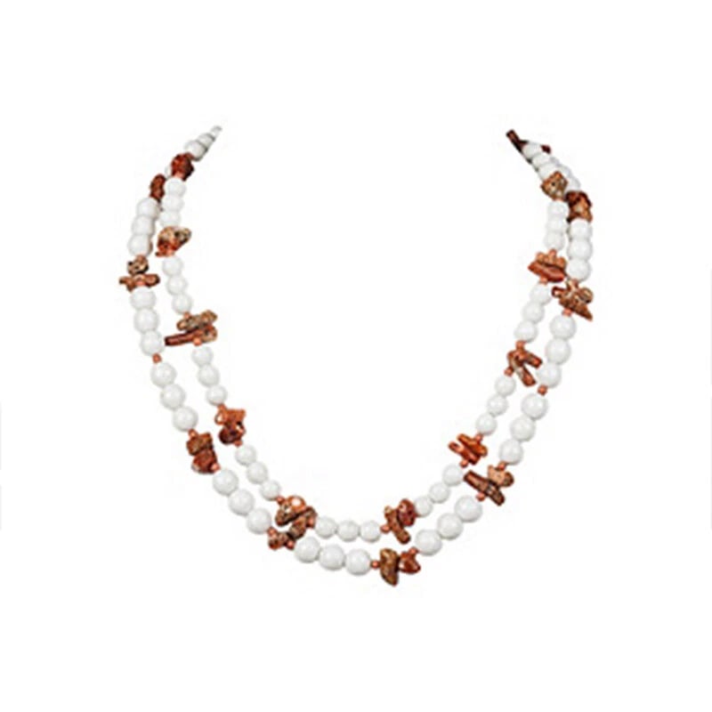 Red Coral and Plastic Beaded Necklace: Title:Red Coral and Plastic Beaded Necklace Description:1950s Japanese two-strand necklace of red coral nuggets and white plastic ball beads in this stunning necklace. Closes with hook clasp.