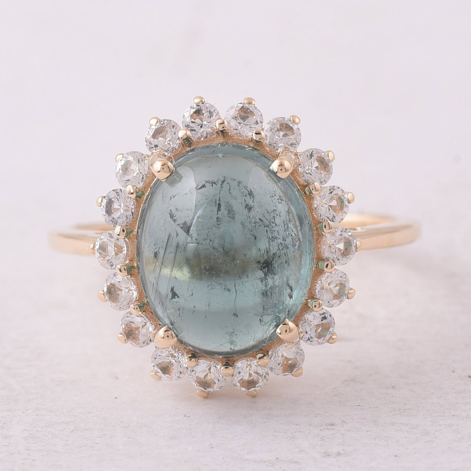 5.32 Ct Oval Tourmaline 9K Gold Ring: 5.32 Total Carat Tourmaline 9K Gold Ring Specifications: Total Weight 2.904 g Center Gemstone Tourmaline Gemstone Carat Weight 4.53 Carats Gemstone Measurements 11X9.20X5.50 mm Additional Gemstones Wh