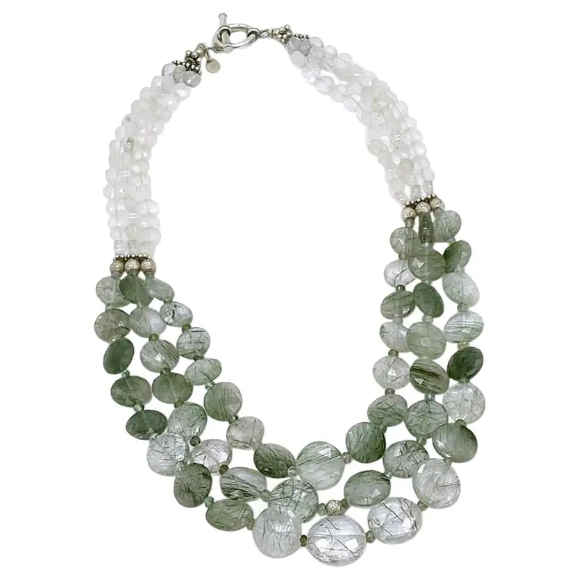 Green Tourmalinated Quartz Necklace: Title: Green Tourmalinated Quartz Necklace Description: This green tourmalinated quartz triple strand necklace is an original work of Nouveau Boutique. We created this princess length necklace with up