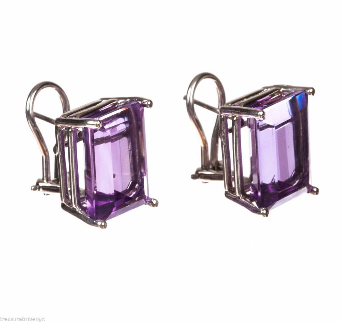 14 kt White Gold Emerald Cut Amethyst Earrings Alberto Juan: Title:14 kt White Gold Emerald Cut Amethyst Earrings Alberto Juan Description:Gorgeous emerald cut amethyst in handmade white gold basket settings from Alberto Juan. Circa, 2015. Emerald stones