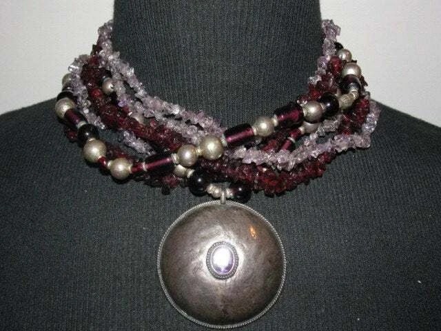 Sterling Silver Amethyst Pendant with Glass Amethyst Garnet Bead Necklace: Title:Sterling Silver Amethyst Pendant with Glass Amethyst Garnet Bead Necklace Description:Great one of a kind handmade torsade necklace. Features 7 strands of sterling silver beads, glass beads, ame