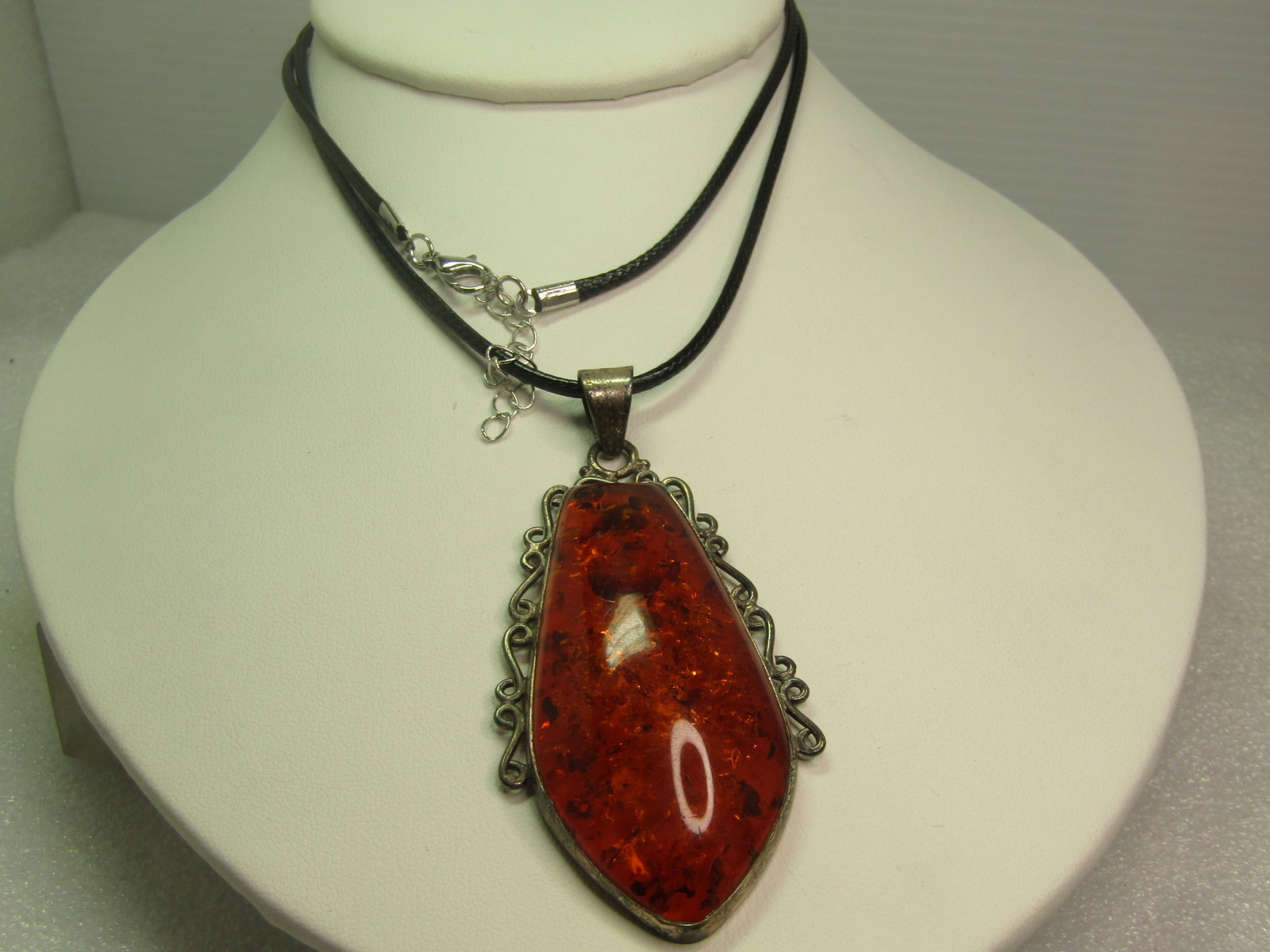 Vintage Sterling Baltic Amber Pendant/Necklace, 26", 1970's-1980's: Title:Vintage Sterling Baltic Amber Pendant/Necklace, 26", 1970's-1980's Description:Vintage Sterling Baltic Amber Pendant/Necklace, 26", 1970's-1980's. Filgiree frame around slightly more than a half