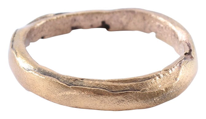 RARE VIKING WEDDING RING 866-1067 AD, SIZE 7 1/4: 9th-11th century, Cambridgeshire England. Bronze, with a low rounded face and of 2.9mm width. Made with a central core to distribute the molten metal and heat. The core was then laboriously removed by