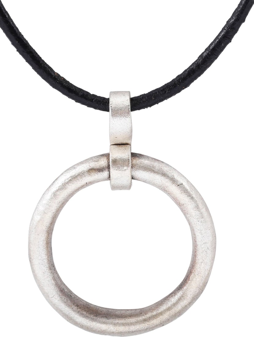 CELTIC PROSPERITY RING NECKLACE C.400-100 BC: Before the Roman invasion of the British Isles, rings of bronze, silver, and gold were used as a means of exchange, particularly in Ireland. Most exchanges of goods and property were conducted by bart