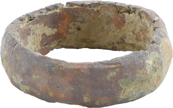 VIKING WARRIOR’S WEDDING RING AS FOUND, 900-1050 AD, SIZE 5 1/2: Bronze, size 5 ½ for the small finger as was the custom. 6.5mm width with rounded face. Made with a core filling the inside which distributed the flowing metal and allowed for slower cooling. The